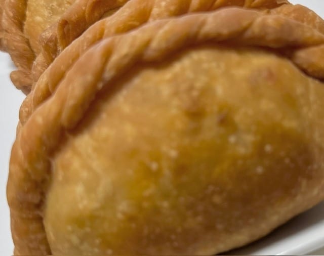 1 Dozen Breakfast Empanadas.